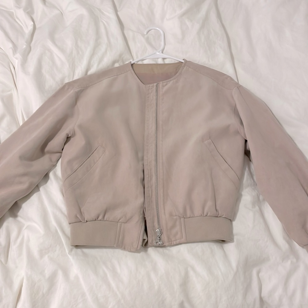 A dust pink jacket